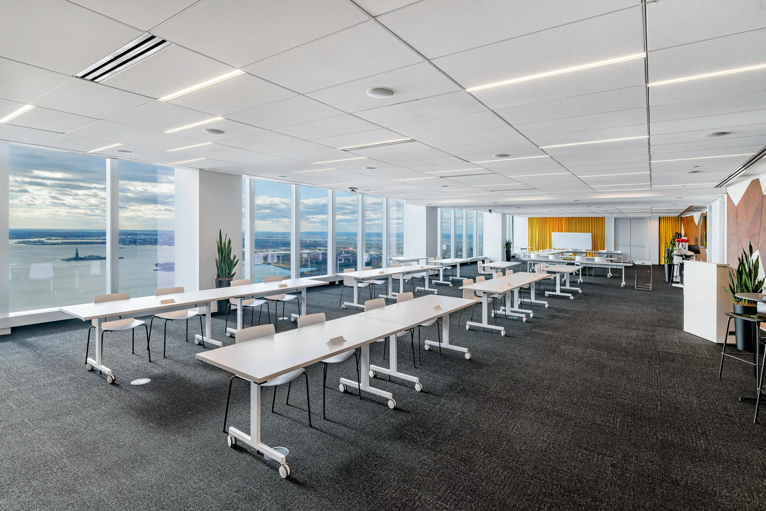 Scenic view of an oceanfront from a modern looking conference room.