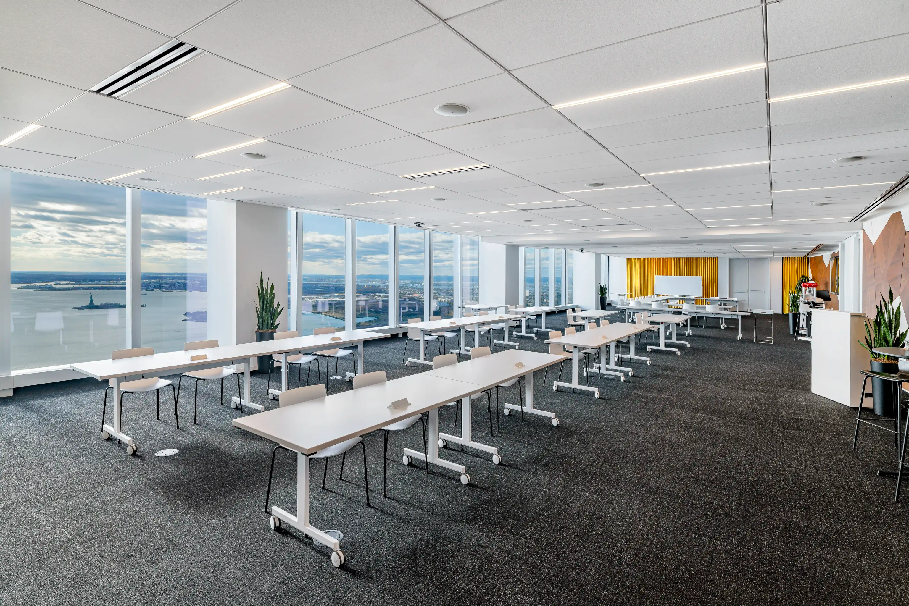 Scenic view of an oceanfront from a modern looking conference room. 